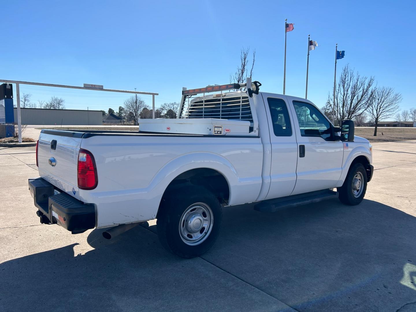 2015 White /Gray Ford F-250 SD (1FT7X2A62FE) with an 6.2L V8 OHV 16V engine, 6-Speed Automatic transmission, located at 17760 Hwy 62, Morris, OK, 74445, (918) 733-4887, 35.609104, -95.877060 - 2015 FORD F250 HAS THE 6.2 V8 ENGINE. THIS TRUCK IS BI-FUEL (RUNS ON BOTH CNG OR GASOLINE) FEATURES MANUAL SEATS, MANUAL LOCKS, MANUAL WINDOWS, MANUAL MIRRORS, AM/FM RADIO, CRUISE CONTROL, TRACTION CONTROL, BACK UP CAMERA. EQUIPPED WITH A WESTPORT BI-FUEL CNG FUEL SYSTEM. IT RUNS ON CNG (COMPRESSED - Photo#4